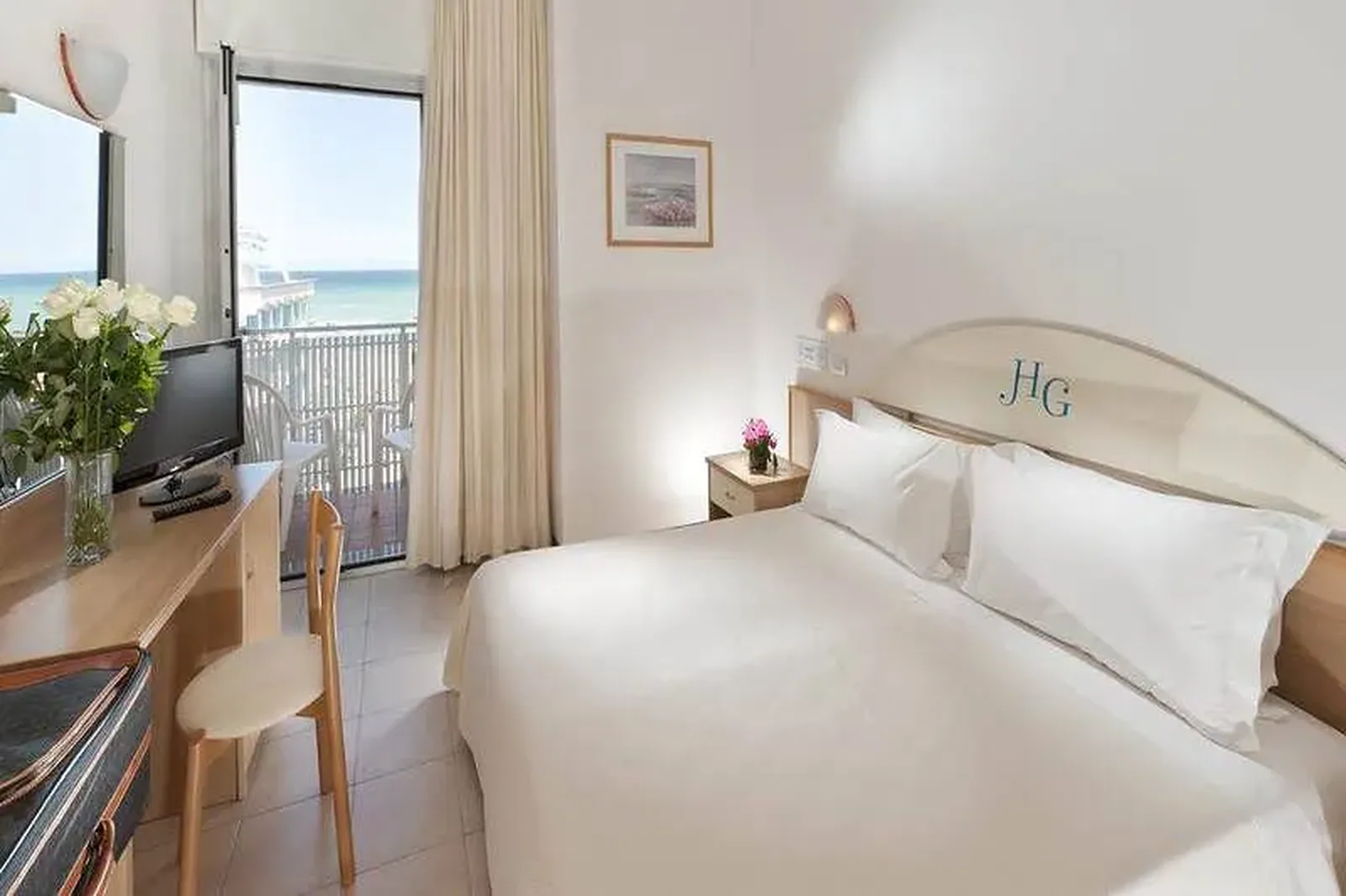 Spavaća soba sa balkonom i pogledom na more · Hotel Gabbiano, Cattolica